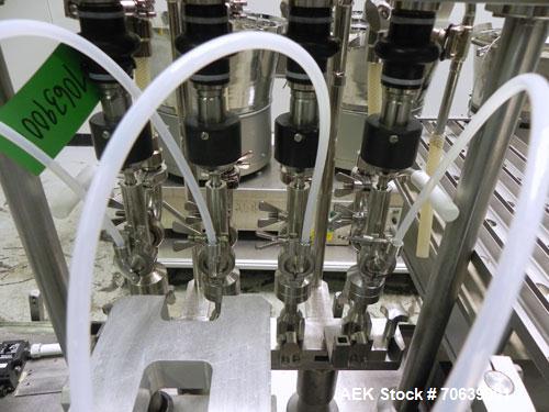 Used Groninger Syringe Filling Line, stainless steel on product contact parts. Line consists of model DFVK4000S inline (4) head filler, RTA3005 filler and HEA100 labeler.