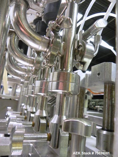 Used Groninger Syringe Filling Line, stainless steel on product contact parts. Line consists of model DFVK4000S inline (4) head filler, RTA3005 filler and HEA100 labeler.