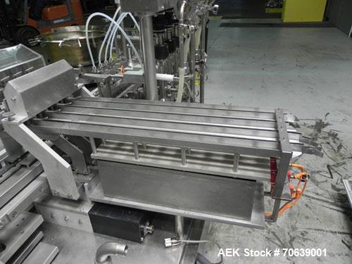 Used Groninger Syringe Filling Line, stainless steel on product contact parts. Line consists of model DFVK4000S inline (4) head filler, RTA3005 filler and HEA100 labeler.
