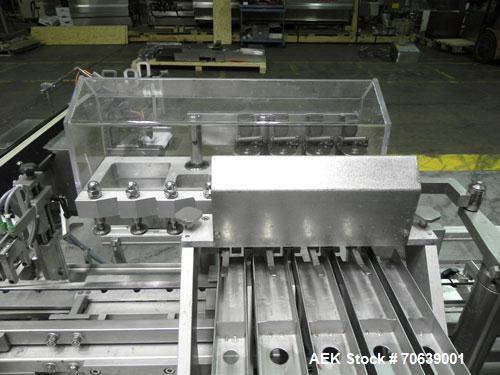 Used Groninger Syringe Filling Line, stainless steel on product contact parts. Line consists of model DFVK4000S inline (4) head filler, RTA3005 filler and HEA100 labeler.