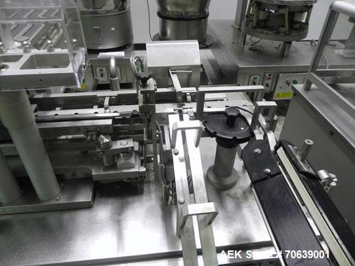 Used Groninger Syringe Filling Line, stainless steel on product contact parts. Line consists of model DFVK4000S inline (4) head filler, RTA3005 filler and HEA100 labeler.