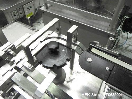 Used Groninger Syringe Filling Line, stainless steel on product contact parts. Line consists of model DFVK4000S inline (4) head filler, RTA3005 filler and HEA100 labeler.