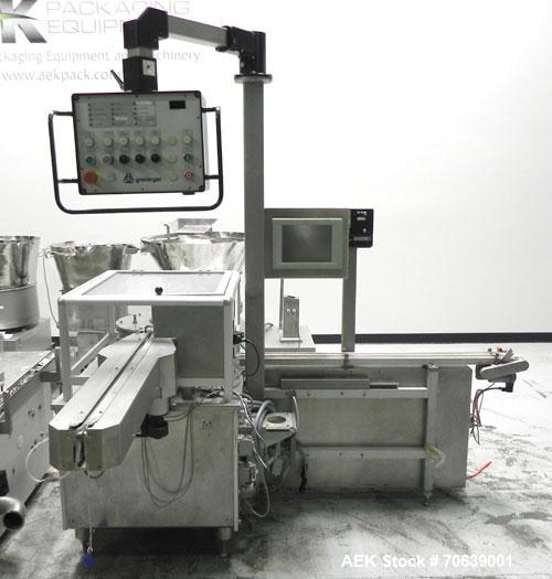 Used Groninger Syringe Filling Line, stainless steel on product contact parts. Line consists of model DFVK4000S inline (4) head filler, RTA3005 filler and HEA100 labeler.