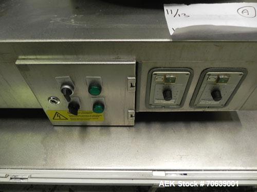 Used Groninger Syringe Filling Line, stainless steel on product contact parts. Line consists of model DFVK4000S inline (4) head filler, RTA3005 filler and HEA100 labeler.