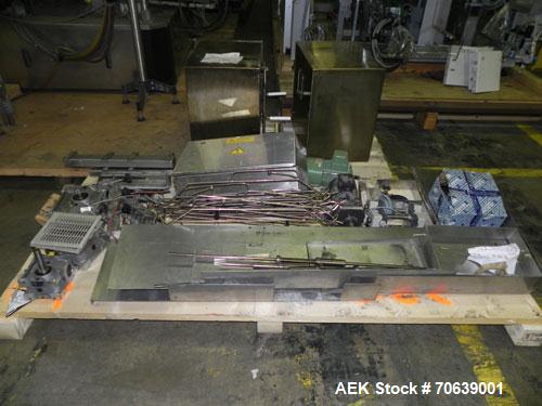 Used Groninger Syringe Filling Line, stainless steel on product contact parts. Line consists of model DFVK4000S inline (4) head filler, RTA3005 filler and HEA100 labeler.