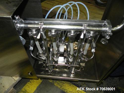 Used Groninger Syringe Filling Line, stainless steel on product contact parts. Line consists of model DFVK4000S inline (4) head filler, RTA3005 filler and HEA100 labeler.