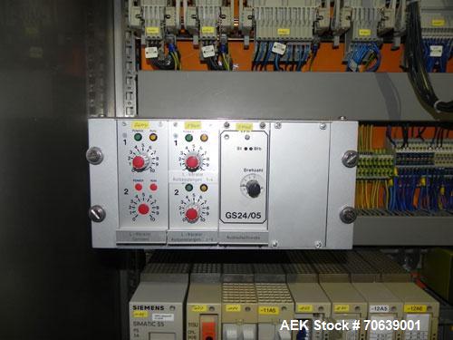 Used Groninger Syringe Filling Line, stainless steel on product contact parts. Line consists of model DFVK4000S inline (4) head filler, RTA3005 filler and HEA100 labeler.