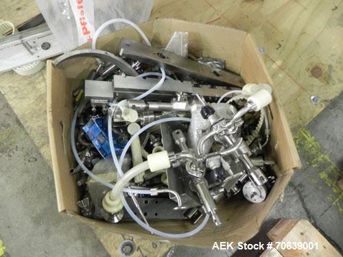 Used Groninger Syringe Filling Line, stainless steel on product contact parts. Line consists of model DFVK4000S inline (4) head filler, RTA3005 filler and HEA100 labeler.