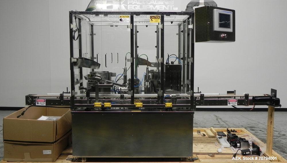 Used Intellitech IntelliFiller Model AFS I-3500C Liquid Filler Stopper and Screw / Crimp Capper. Monoblock Machine is capable of speeds up to 45 (1-up) and 90 (2-up) containers per minute. Machine ac...