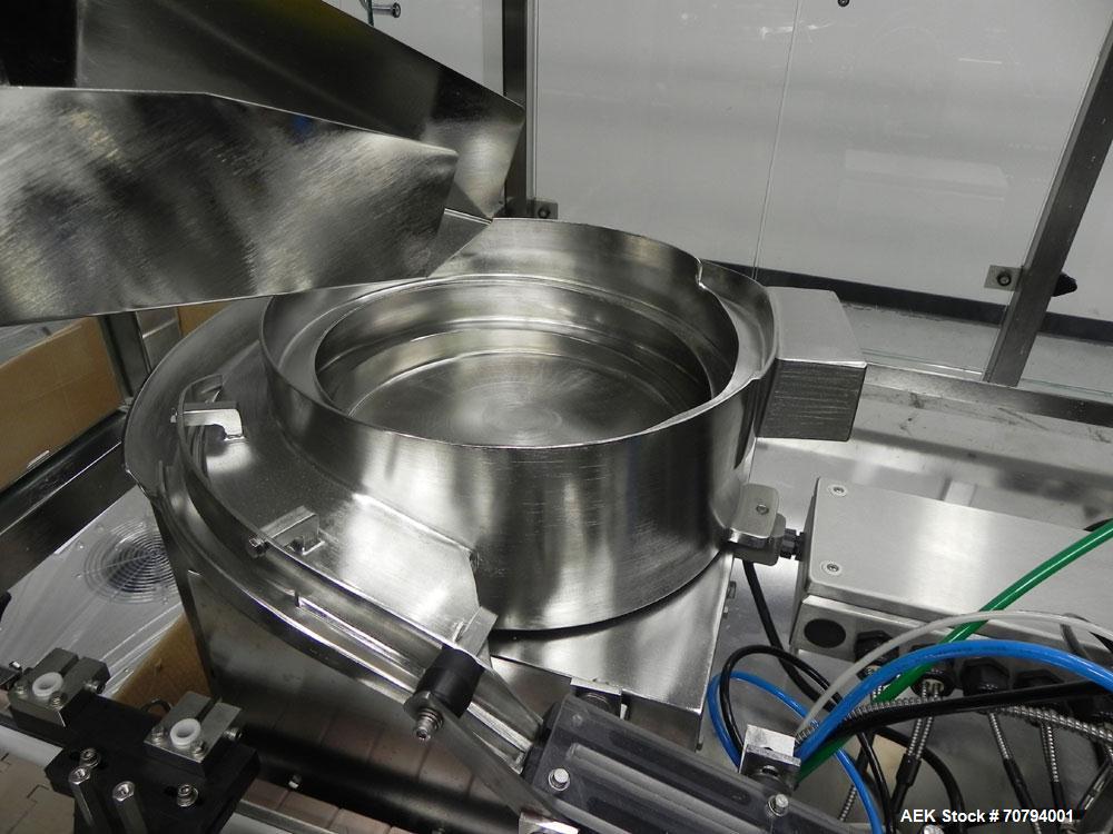 Used Intellitech IntelliFiller Model AFS I-3500C Liquid Filler Stopper and Screw / Crimp Capper. Monoblock Machine is capable of speeds up to 45 (1-up) and 90 (2-up) containers per minute. Machine ac...