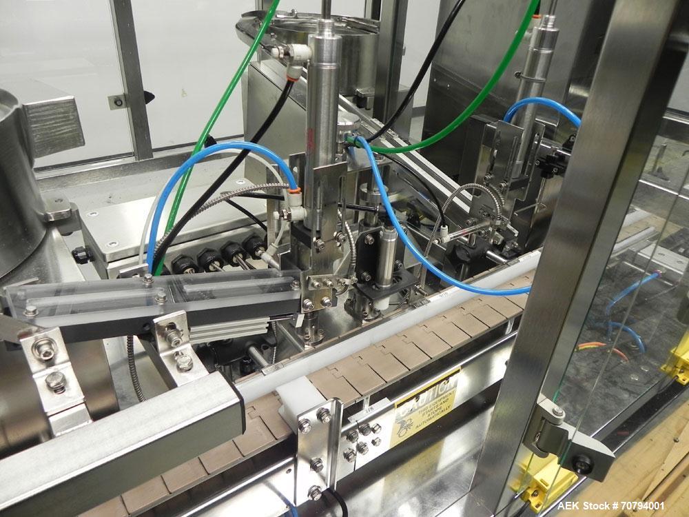 Used Intellitech IntelliFiller Model AFS I-3500C Liquid Filler Stopper and Screw / Crimp Capper. Monoblock Machine is capable of speeds up to 45 (1-up) and 90 (2-up) containers per minute. Machine ac...