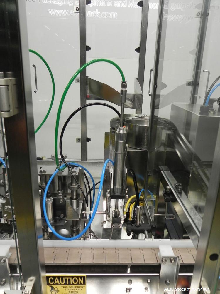 Used Intellitech IntelliFiller Model AFS I-3500C Liquid Filler Stopper and Screw / Crimp Capper. Monoblock Machine is capable of speeds up to 45 (1-up) and 90 (2-up) containers per minute. Machine ac...