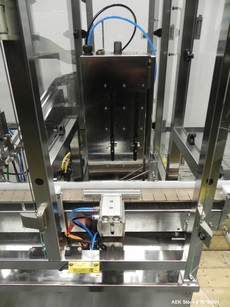 Used Intellitech IntelliFiller Model AFS I-3500C Liquid Filler Stopper and Screw / Crimp Capper. Monoblock Machine is capable of speeds up to 45 (1-up) and 90 (2-up) containers per minute. Machine ac...