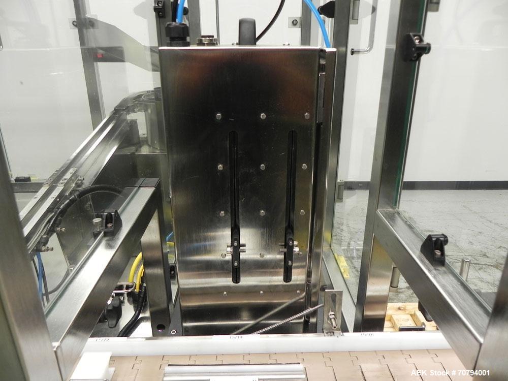 Used Intellitech IntelliFiller Model AFS I-3500C Liquid Filler Stopper and Screw / Crimp Capper. Monoblock Machine is capable of speeds up to 45 (1-up) and 90 (2-up) containers per minute. Machine ac...