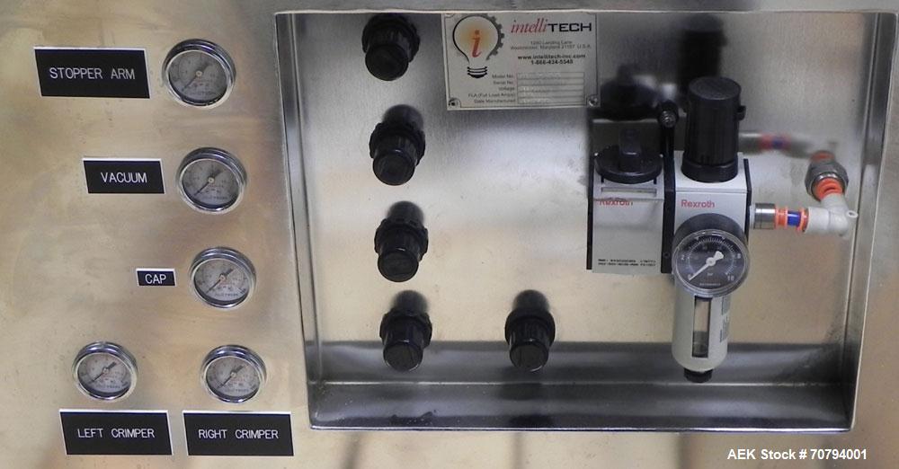 Used Intellitech IntelliFiller Model AFS I-3500C Liquid Filler Stopper and Screw / Crimp Capper. Monoblock Machine is capable of speeds up to 45 (1-up) and 90 (2-up) containers per minute. Machine ac...