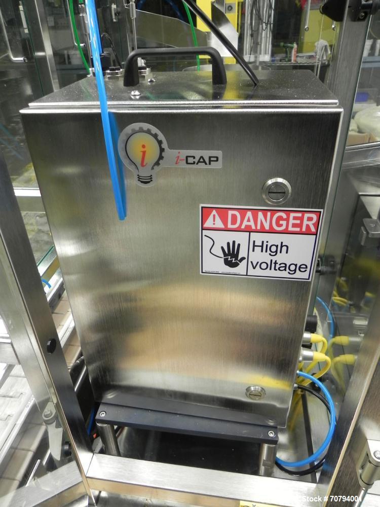 Used Intellitech IntelliFiller Model AFS I-3500C Liquid Filler Stopper and Screw / Crimp Capper. Monoblock Machine is capable of speeds up to 45 (1-up) and 90 (2-up) containers per minute. Machine ac...