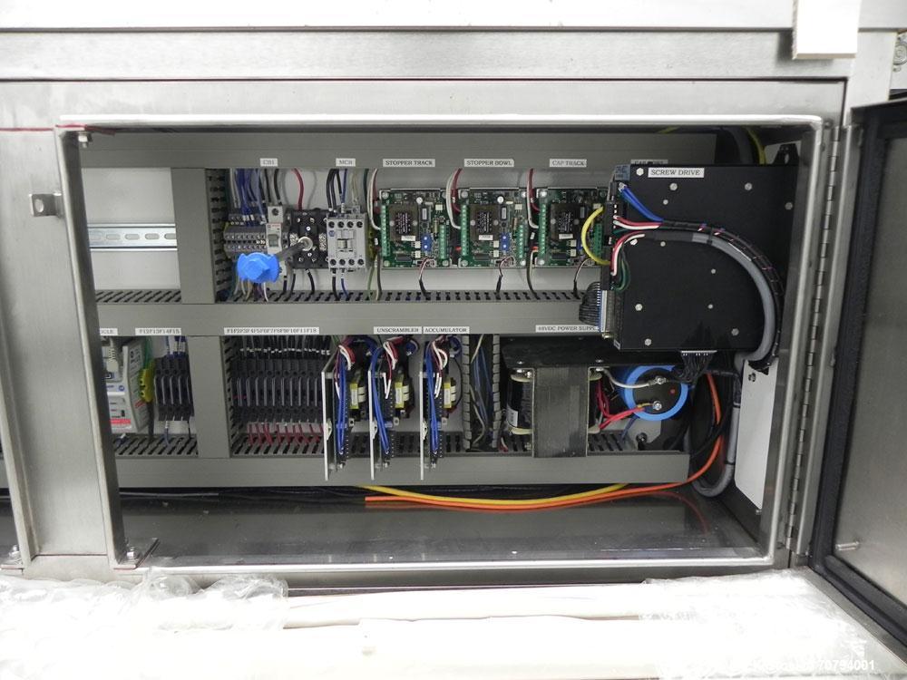 Used Intellitech IntelliFiller Model AFS I-3500C Liquid Filler Stopper and Screw / Crimp Capper. Monoblock Machine is capable of speeds up to 45 (1-up) and 90 (2-up) containers per minute. Machine ac...