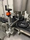 Used Used Groninger inserter capper, Model KVK 206, speeds up to 10000 BPH(166 BPM), with (2) 6 head stations, currently set up with (6) head dropper inserter, and (6) head capper stations, 30 - 230 ...