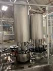 Used Used Groninger inserter capper, Model KVK 206, speeds up to 10000 BPH(166 BPM), with (2) 6 head stations, currently set up with (6) head dropper inserter, and (6) head capper stations, 30 - 230 ...