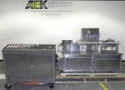 Used Bosch TL Systems Monoblock Vial Filler & Stoppering Machine. Consists of an 8 head rolling diaphram type filler, vial indexing system and stopper inserter. Has 8 filling heads with a filling rat...
