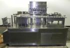 Used Bosch TL Systems Monoblock Vial Filler & Stoppering Machine. Consists of an 8 head rolling diaphram type filler, vial indexing system and stopper inserter. Has 8 filling heads with a filling rat...