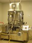 Used Chase Logeman Monoblock Filling Line, Model FPCCL4-12H.  Designed to fill, plug, cap and label at speeds up to 60 containers/minute; fill range from 1 - 125 mL; cap size range from 8 - 32 mm; IM...