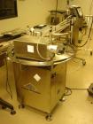 Used Chase Logeman Monoblock Filling Line, Model FPCCL4-12H.  Designed to fill, plug, cap and label at speeds up to 60 containers/minute; fill range from 1 - 125 mL; cap size range from 8 - 32 mm; IM...