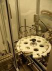 Used Comas Liquid Vial Filler and Capper Monoblock Liquid Filler, Powder Filler RP, Model FC7-50. 3000-4000 parts per hour. This unit has main monoblock with 4 head piston filling mechanism and screw...