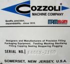 USED: Cozzoli heavy duty table top syringe filler, model F400X. Rated 0 to 50 cycles per minute. Max syringe size of 60ml, filling nozzle range 1.2mm to 6mm. Adjustable volume selector. Accurate with...