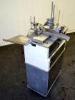 Used Cozzoli FPS1 Automatic Ampoule Filler and Flame Sealer.