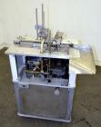 Used Cozzoli FPS1 Automatic Ampoule Filler and Flame Sealer.
