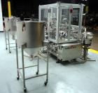 Used Comas Plastic Dispensing Syringe Monoblock Filling System, Model FD120, speeds up to 60 syringes/minute. Dual station index with 2 Ivek Peristaltic product fill pumps, Vibratory Bowl feeders for...