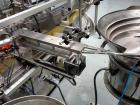 Used Comas Plastic Dispensing Syringe Monoblock Filling System, Model FD120, speeds up to 60 syringes/minute. Dual station index with 2 Ivek Peristaltic product fill pumps, Vibratory Bowl feeders for...
