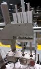 Used Comas Plastic Dispensing Syringe Monoblock Filling System, Model FD120, speeds up to 60 syringes/minute. Dual station index with 2 Ivek Peristaltic product fill pumps, Vibratory Bowl feeders for...