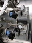 Used Comas Plastic Dispensing Syringe Monoblock Filling System, Model FD120, speeds up to 60 syringes/minute. Dual station index with 2 Ivek Peristaltic product fill pumps, Vibratory Bowl feeders for...