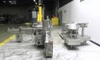 Used Groninger Syringe Filling Line, stainless steel on product contact parts. Line consists of model DFVK4000S inline (4) head filler, RTA3005 filler and HEA100 labeler.