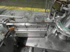 Used Groninger Syringe Filling Line, stainless steel on product contact parts. Line consists of model DFVK4000S inline (4) head filler, RTA3005 filler and HEA100 labeler.