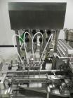 Used Groninger Syringe Filling Line, stainless steel on product contact parts. Line consists of model DFVK4000S inline (4) head filler, RTA3005 filler and HEA100 labeler.