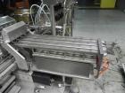 Used Groninger Syringe Filling Line, stainless steel on product contact parts. Line consists of model DFVK4000S inline (4) head filler, RTA3005 filler and HEA100 labeler.