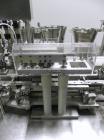 Used Groninger Syringe Filling Line, stainless steel on product contact parts. Line consists of model DFVK4000S inline (4) head filler, RTA3005 filler and HEA100 labeler.