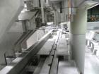 Used Groninger Syringe Filling Line, stainless steel on product contact parts. Line consists of model DFVK4000S inline (4) head filler, RTA3005 filler and HEA100 labeler.