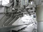 Used Groninger Syringe Filling Line, stainless steel on product contact parts. Line consists of model DFVK4000S inline (4) head filler, RTA3005 filler and HEA100 labeler.