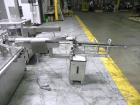 Used Groninger Syringe Filling Line, stainless steel on product contact parts. Line consists of model DFVK4000S inline (4) head filler, RTA3005 filler and HEA100 labeler.
