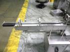 Used Groninger Syringe Filling Line, stainless steel on product contact parts. Line consists of model DFVK4000S inline (4) head filler, RTA3005 filler and HEA100 labeler.