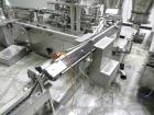 Used Groninger Syringe Filling Line, stainless steel on product contact parts. Line consists of model DFVK4000S inline (4) head filler, RTA3005 filler and HEA100 labeler.