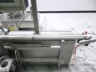 Used Groninger Syringe Filling Line, stainless steel on product contact parts. Line consists of model DFVK4000S inline (4) head filler, RTA3005 filler and HEA100 labeler.