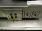 Used Groninger Syringe Filling Line, stainless steel on product contact parts. Line consists of model DFVK4000S inline (4) head filler, RTA3005 filler and HEA100 labeler.