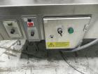 Used Groninger Syringe Filling Line, stainless steel on product contact parts. Line consists of model DFVK4000S inline (4) head filler, RTA3005 filler and HEA100 labeler.
