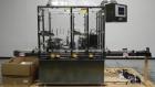 Used Intellitech IntelliFiller Model AFS I-3500C Liquid Filler Stopper and Screw / Crimp Capper. Monoblock Machine is capable of speeds up to 45 (1-up) and 90 (2-up) containers per minute. Machine ac...