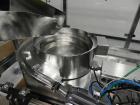 Used Intellitech IntelliFiller Model AFS I-3500C Liquid Filler Stopper and Screw / Crimp Capper. Monoblock Machine is capable of speeds up to 45 (1-up) and 90 (2-up) containers per minute. Machine ac...